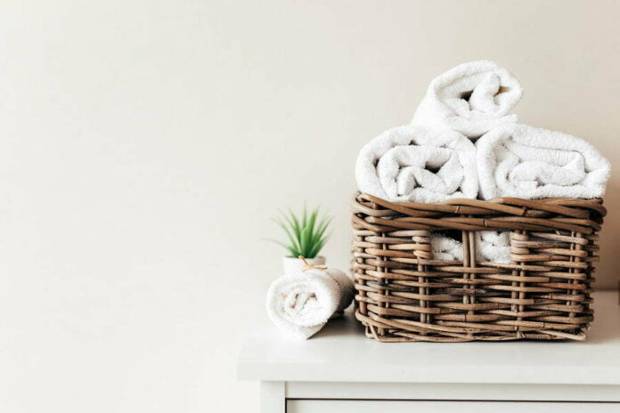 How to display towels in a basket