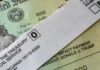 How to cash a stimulus check for someone in jail