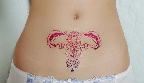 Womb Sternum Tattoo