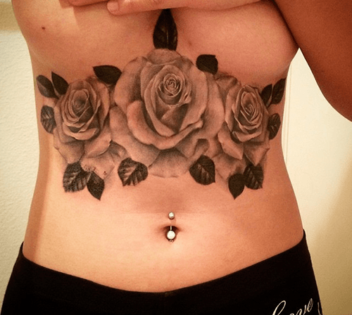 Rose under breast tattoos 