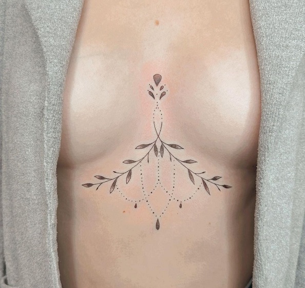 Tiny tattoos sternum breast tattoos
