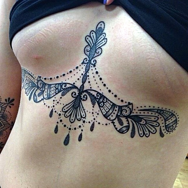 Lace tattoos under the boob design