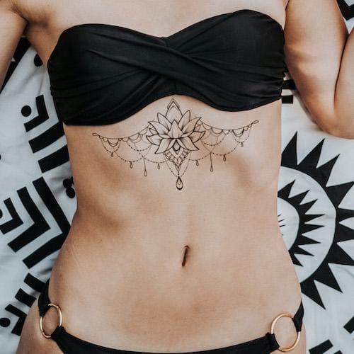 sternal tattoo of a lotus